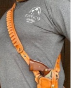 Adjustable harness with or without ammo slide made to accommodate 6 or 12 cartridges. Right or left hand option.